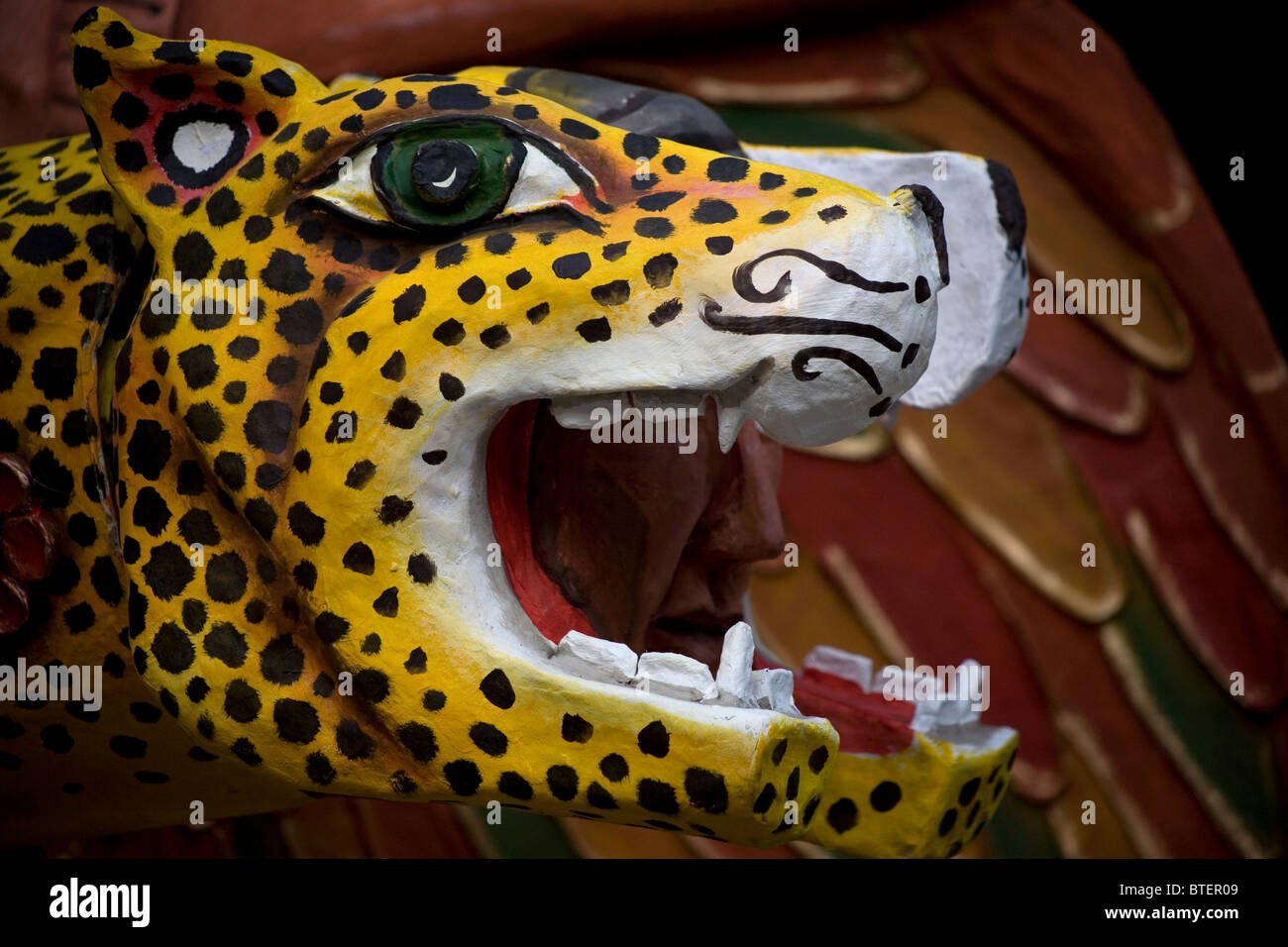 A jaguar's head decorate an alebrije, a paper sculpture, in Mexico City, October 27, 2010. Stock Photo