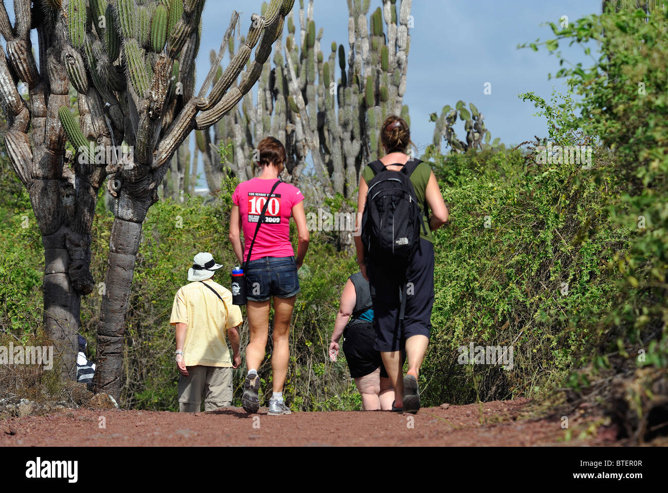 People walking on the park of Charles Darwin research Station, Galapagos, Ecuador Stock Photo