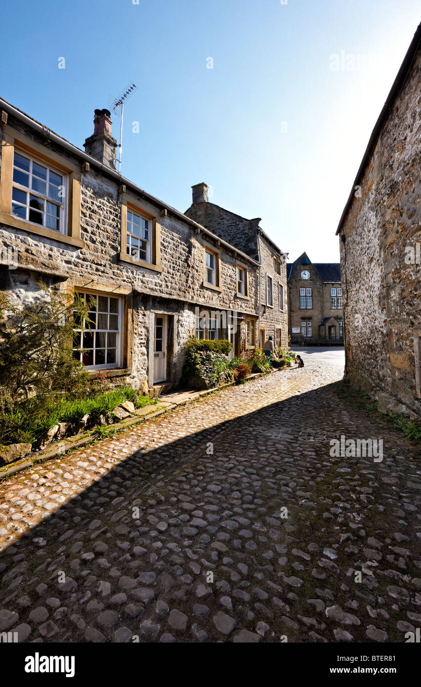A cobbled street in the Yorkshire Dales village of Grassington, North Yorkshire UK Stock Photo