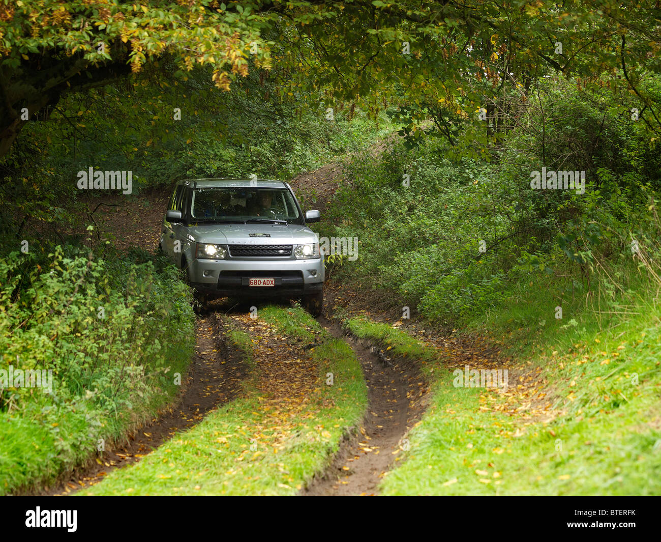 Range rover Sport driving offroad at the Domaine d'Arthey estate in Belgium Stock Photo