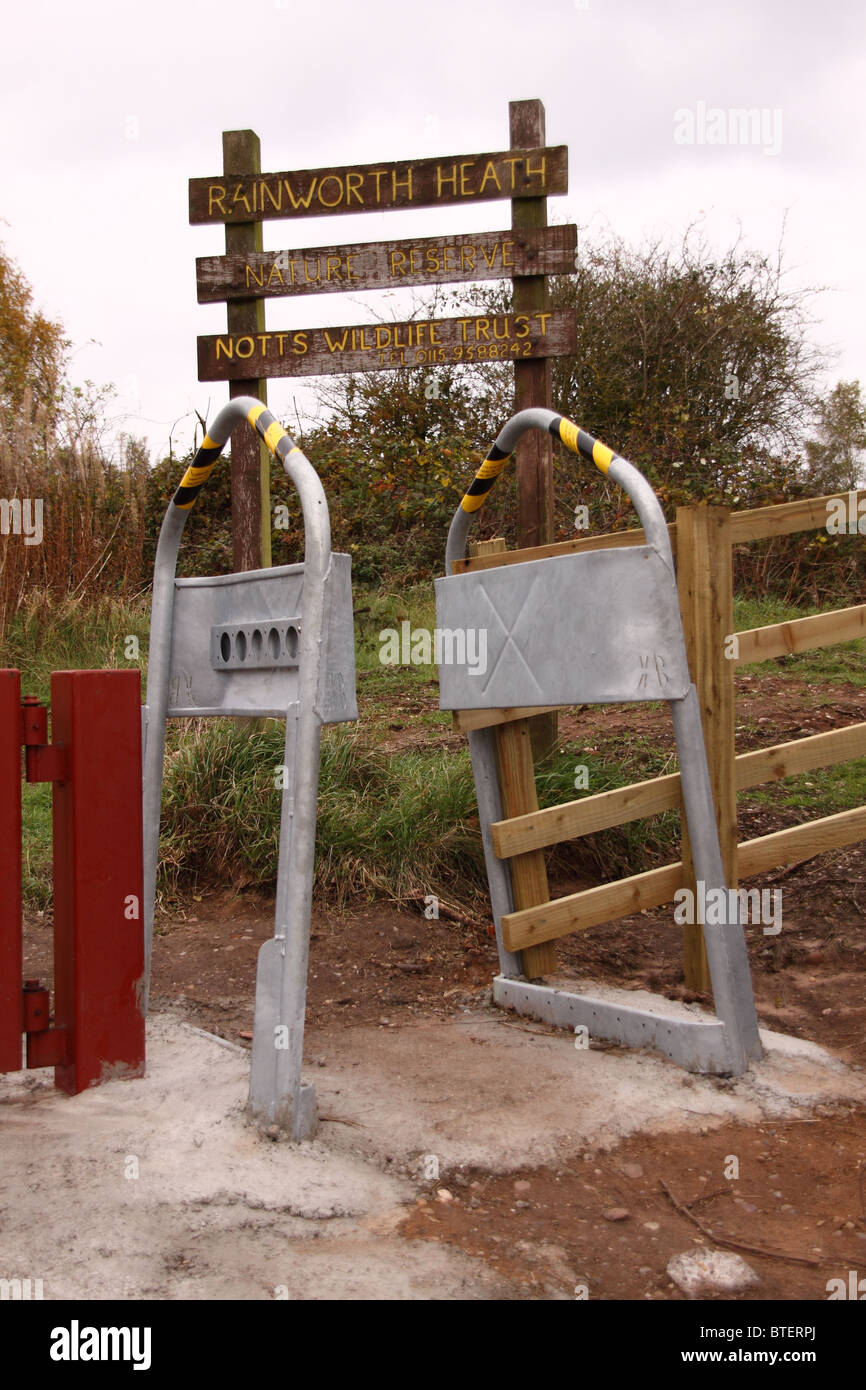 motorbike restriction barrier at the entrance to a nottinghamshire wildlife trust nature reserve Stock Photo