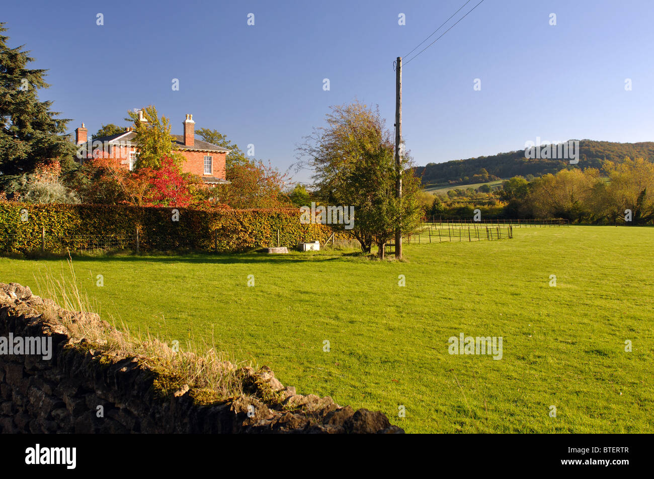 View from Little Comberton churchyard towards Bredon Hill, Worcestershire, England, UK Stock Photo