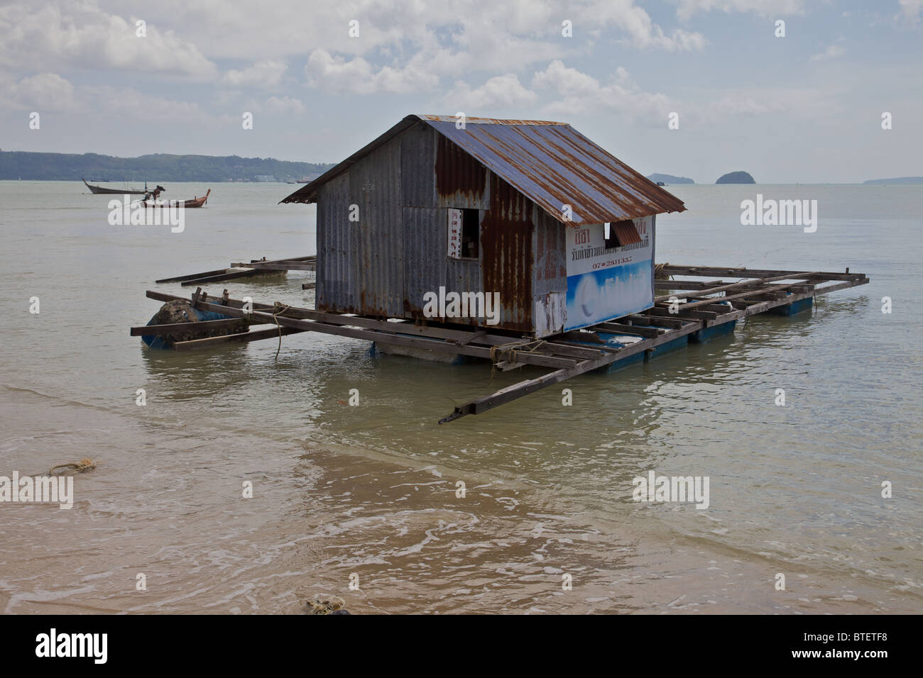 A fish farm house on the beach in Chalong bay, Phuket Thailand Stock Photo Alamy
