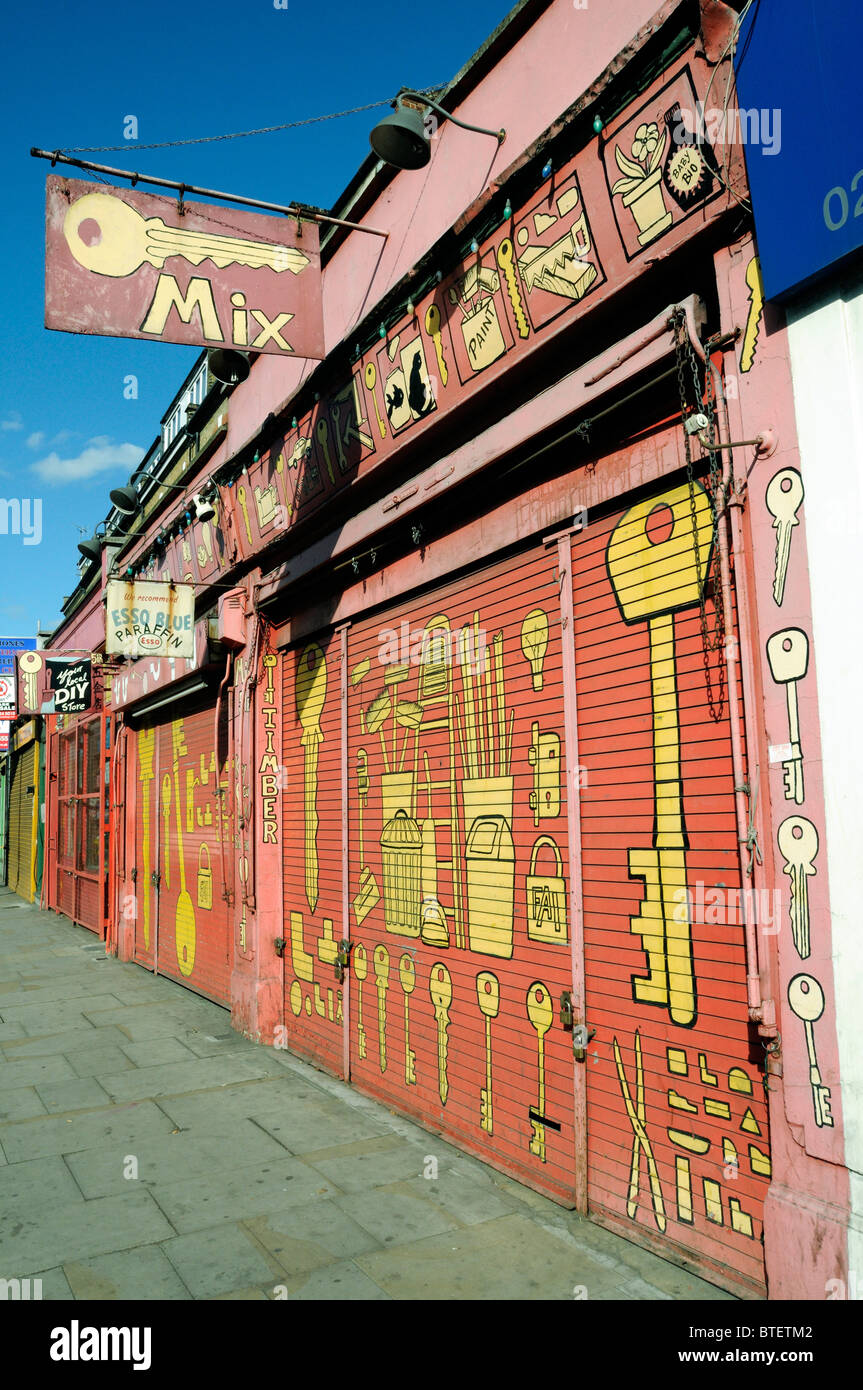 DIY Store with shutters down showing keys and hardware painted on the