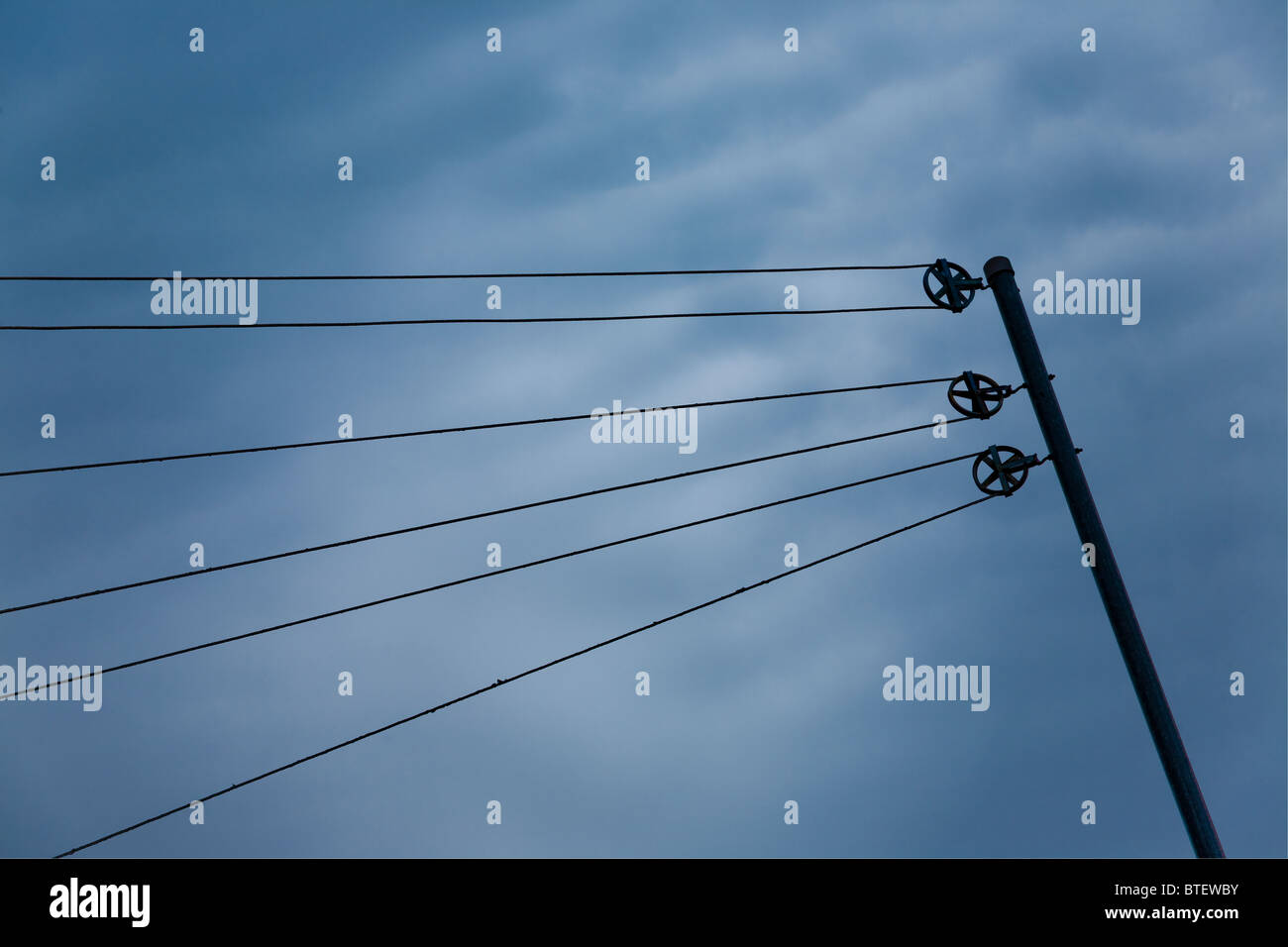 Rope for clothesline running through three pulleys Stock Photo Alamy