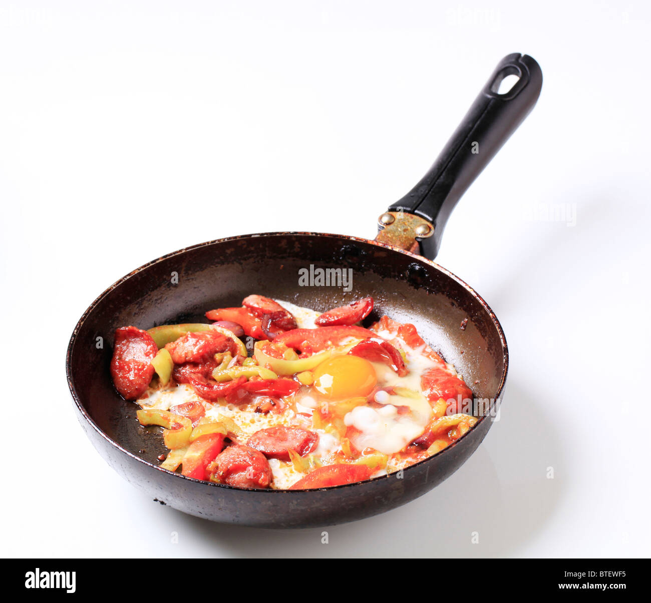 Vegetable and sausage stir fry Stock Photo - Alamy