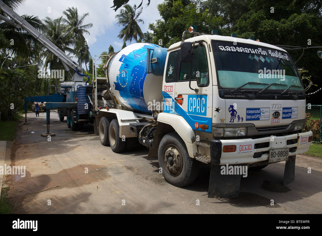 Cement mixer working in Phuket Thailand Stock Photo Alamy
