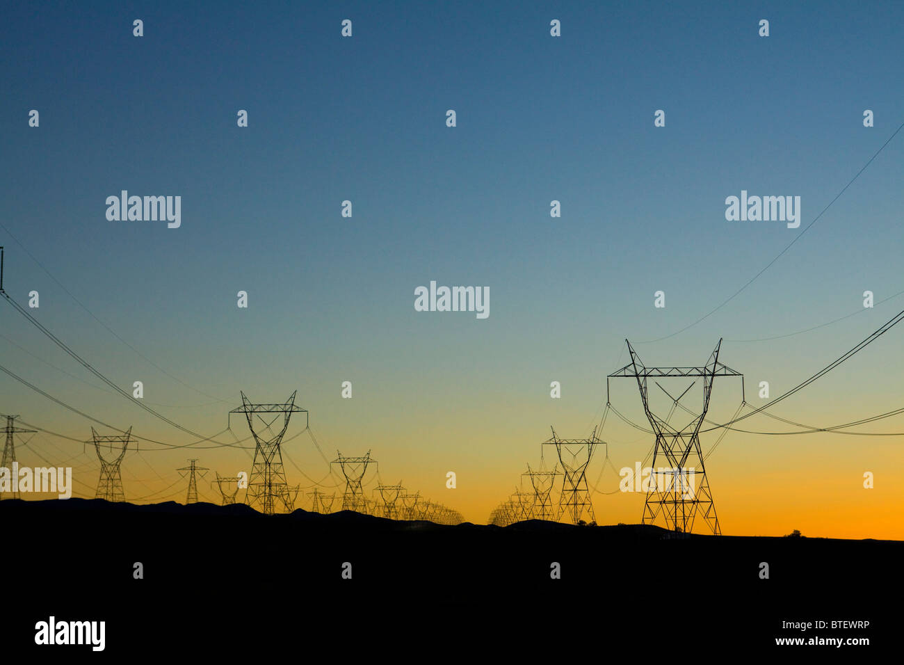Electricity transmission towers (electric pylons) - California USA Stock Photo