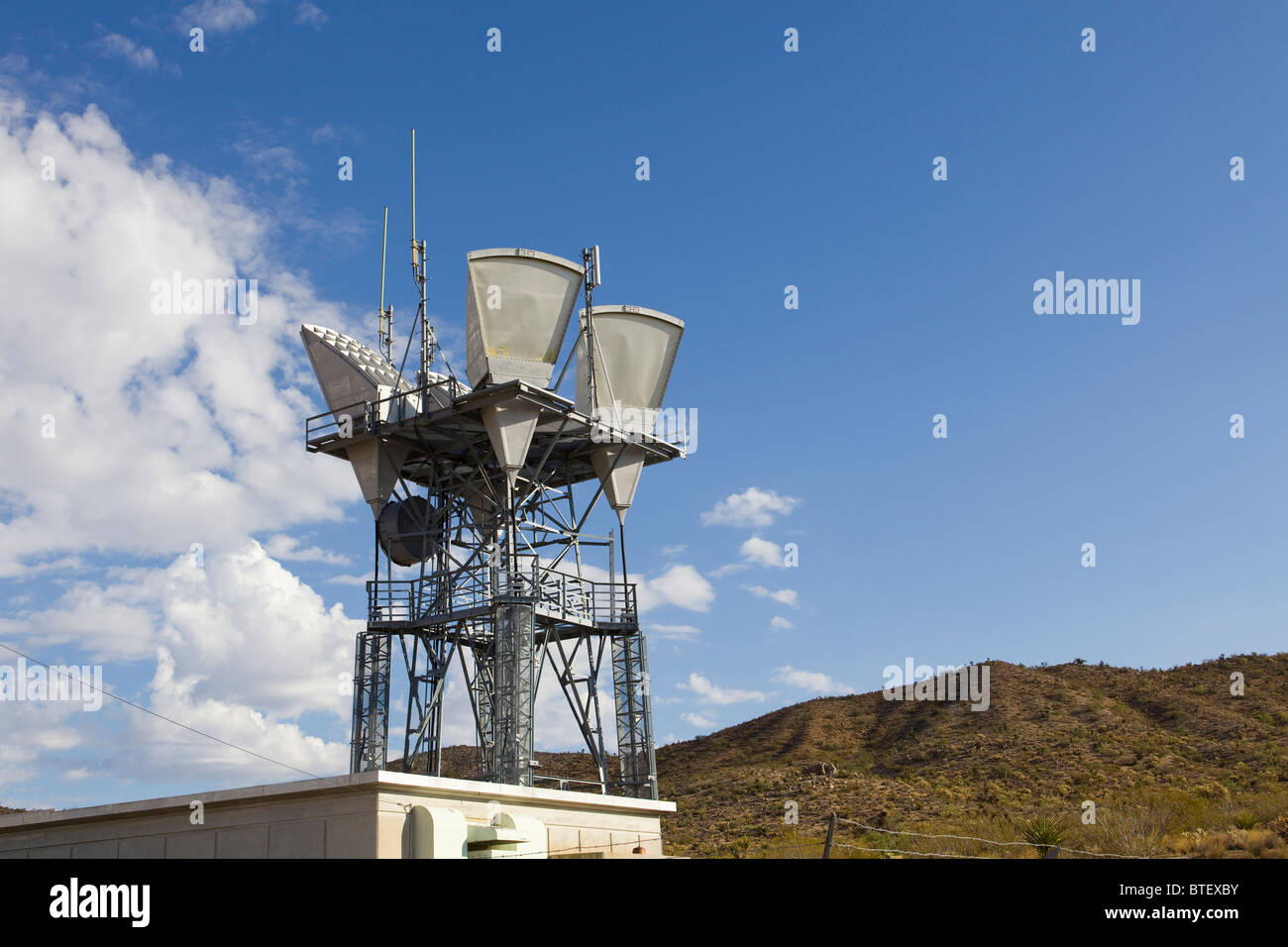 Old microwave antennae tower Stock Photo