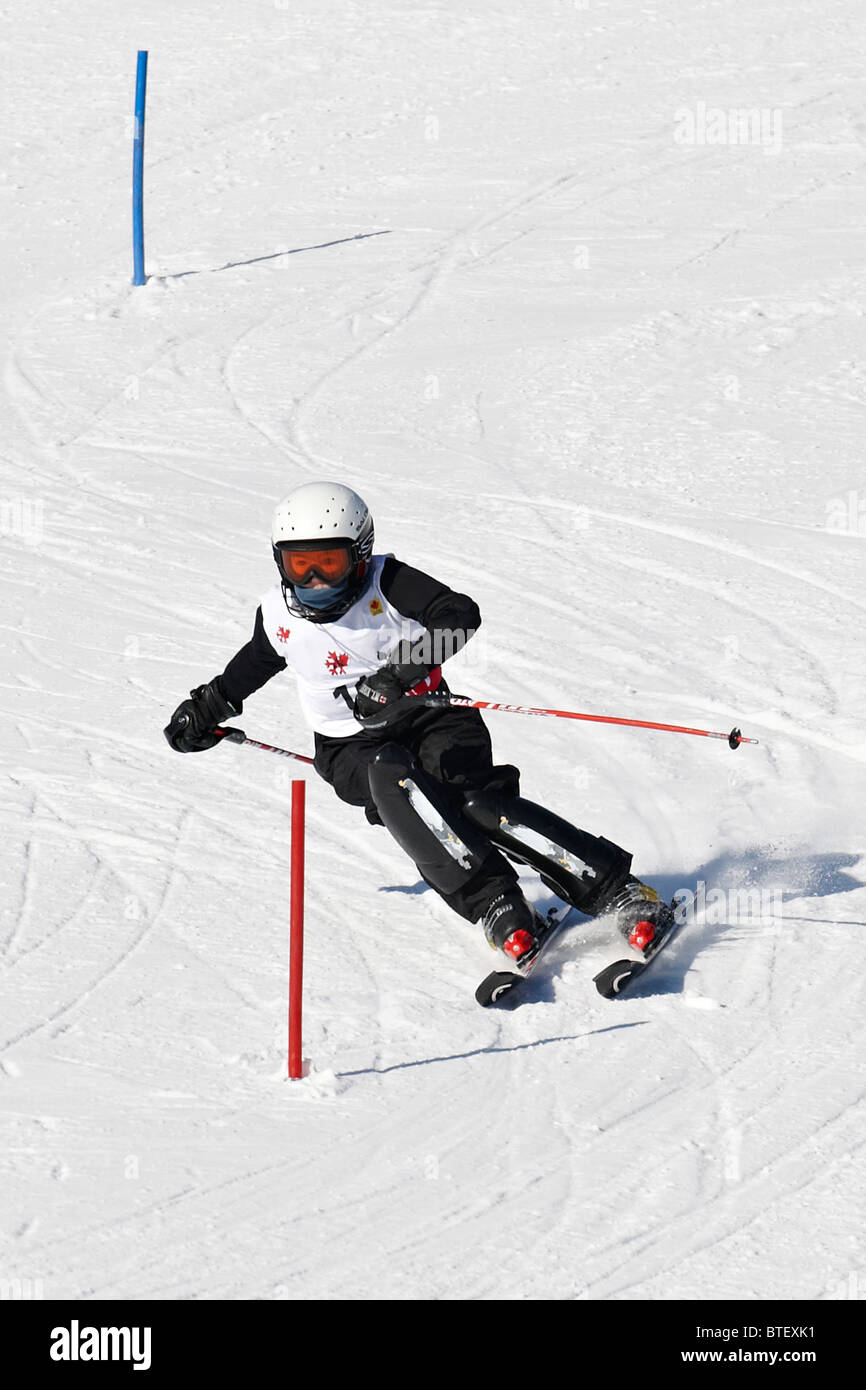 Boy from Nancy Green League skiing, Hidden Valley, Huntsville, Ontario Stock Photo