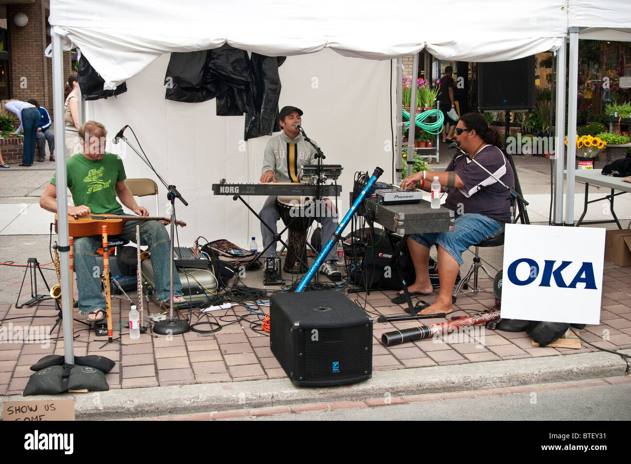 Australian band OKA performing outdoors at the Toronto Buskerfest, Canada Stock Photo