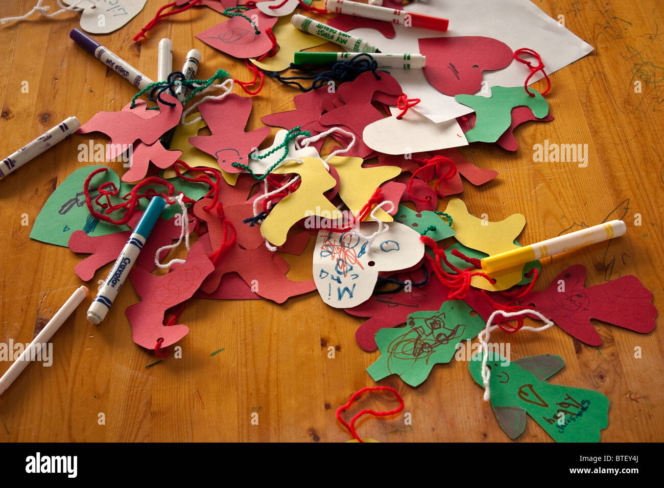 Hand-made paper craft decorations, hearts and shapes Stock Photo