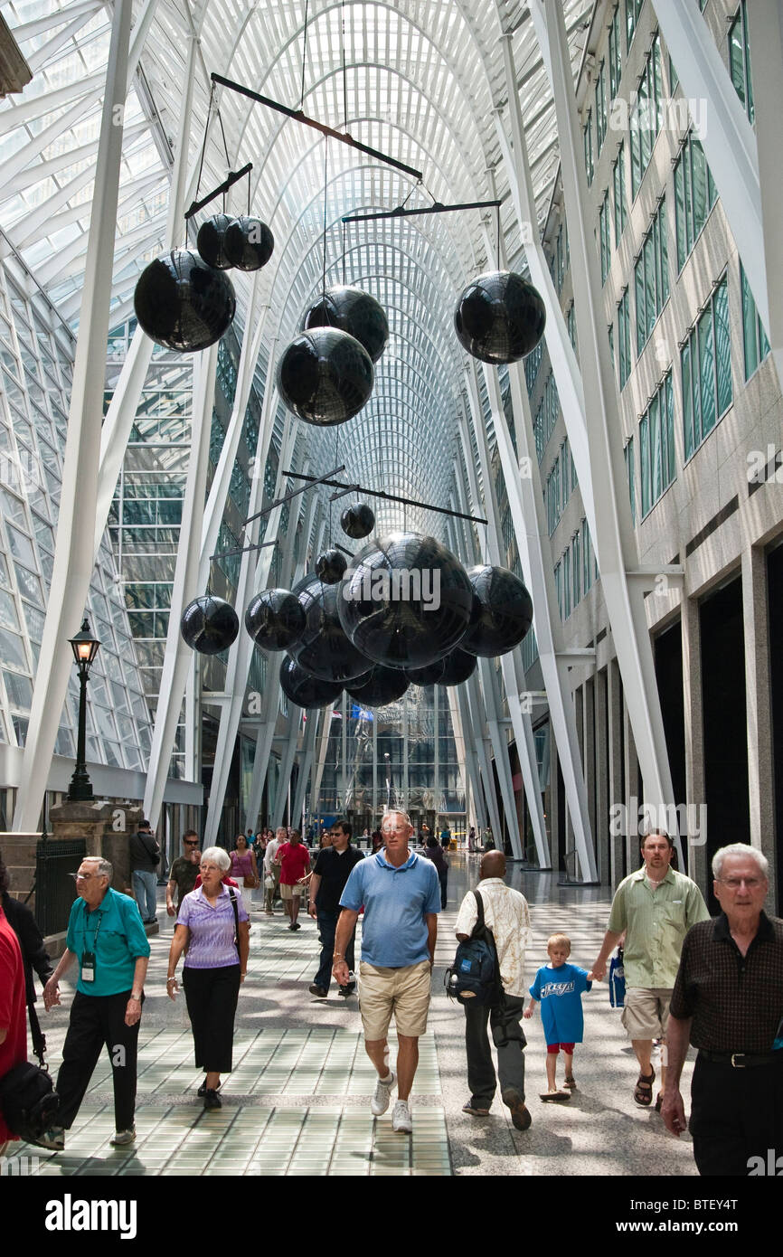 People at the Brookfield Place, formerly BCE Place. Luminato art festival in progress, installation above. Stock Photo