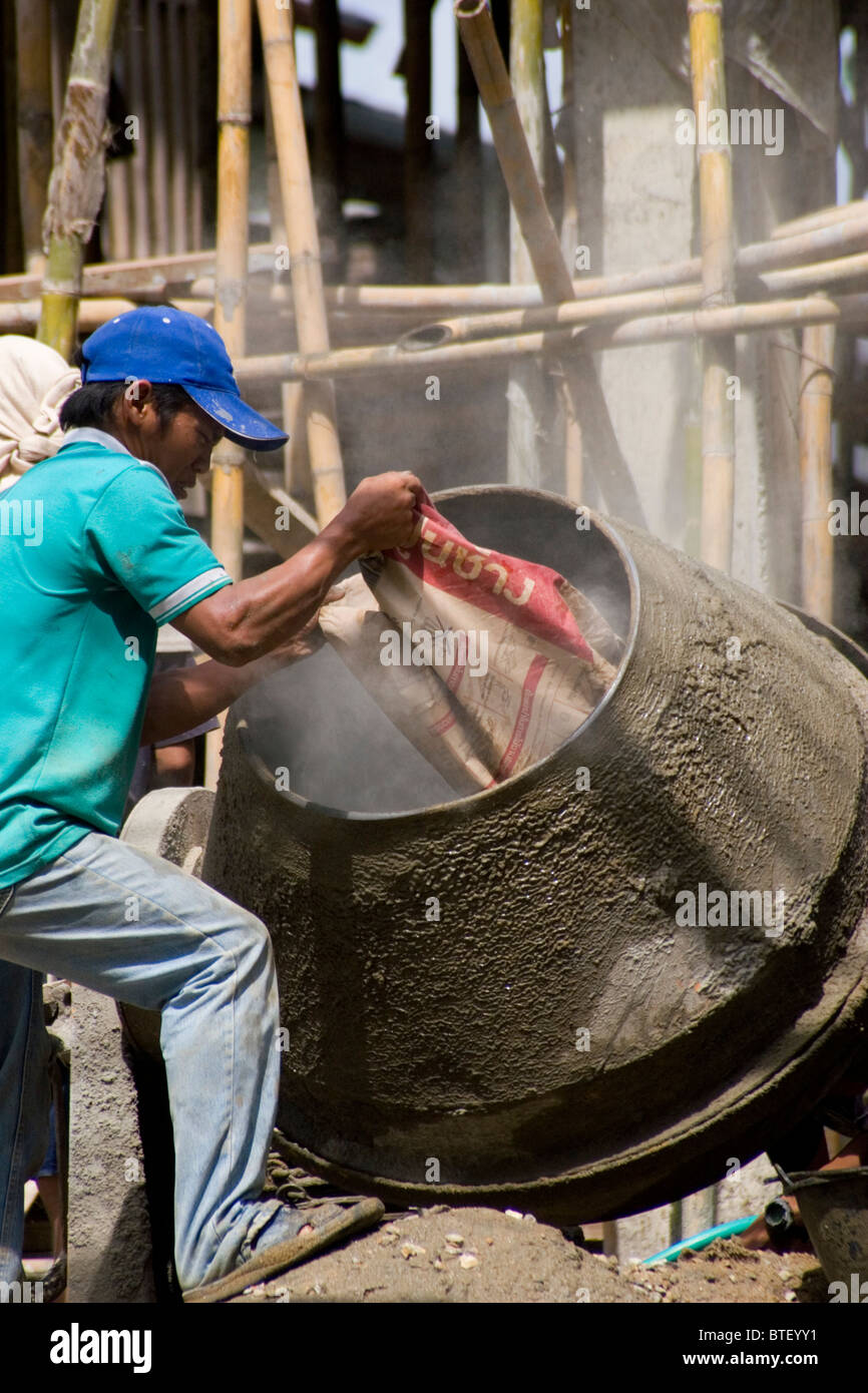 Man using cement mixer hi-res stock photography and images - Alamy