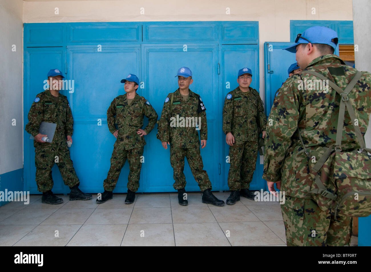 A group of peacekeeping policemen from Japan carrying out The United Nations Stabilization Mission in Haiti MINUSTAH in Port au Prince Haiti Stock Photo