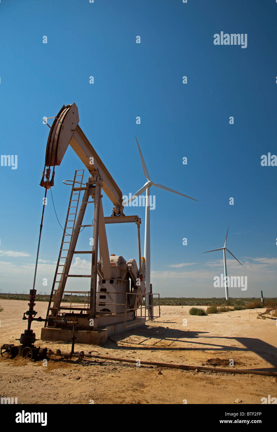 Stanton, Texas - An oil well and wind turbines in west Texas. Stock Photo