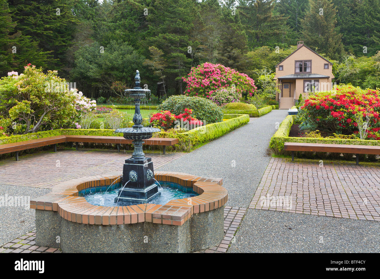 Fountain in the gardens at Shore Acres State Park on the Cape Arago Highway on the coast of Oregon Stock Photo