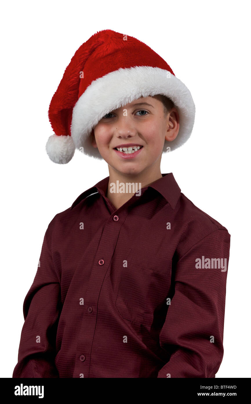 A portrait of an eight year old boy in a santa hat Stock Photo Alamy