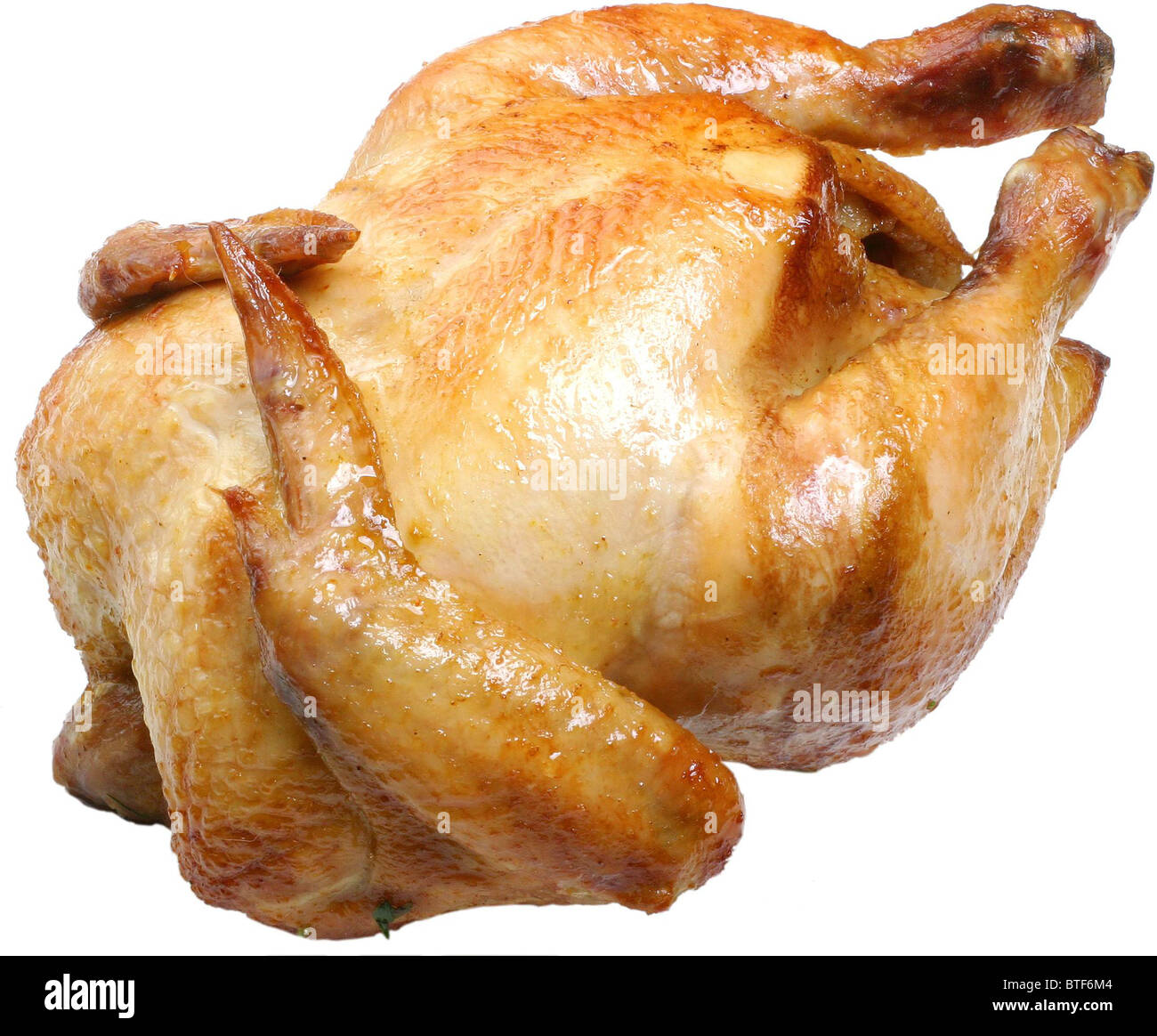 Whole grilled chicken isolated on a white background. Stock Photo
