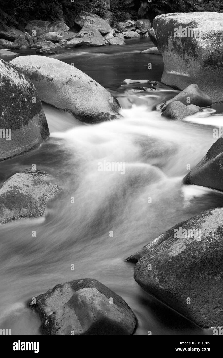 Fast flowing water at Roche du Diable, near Quimperle, South Brittany, France Stock Photo