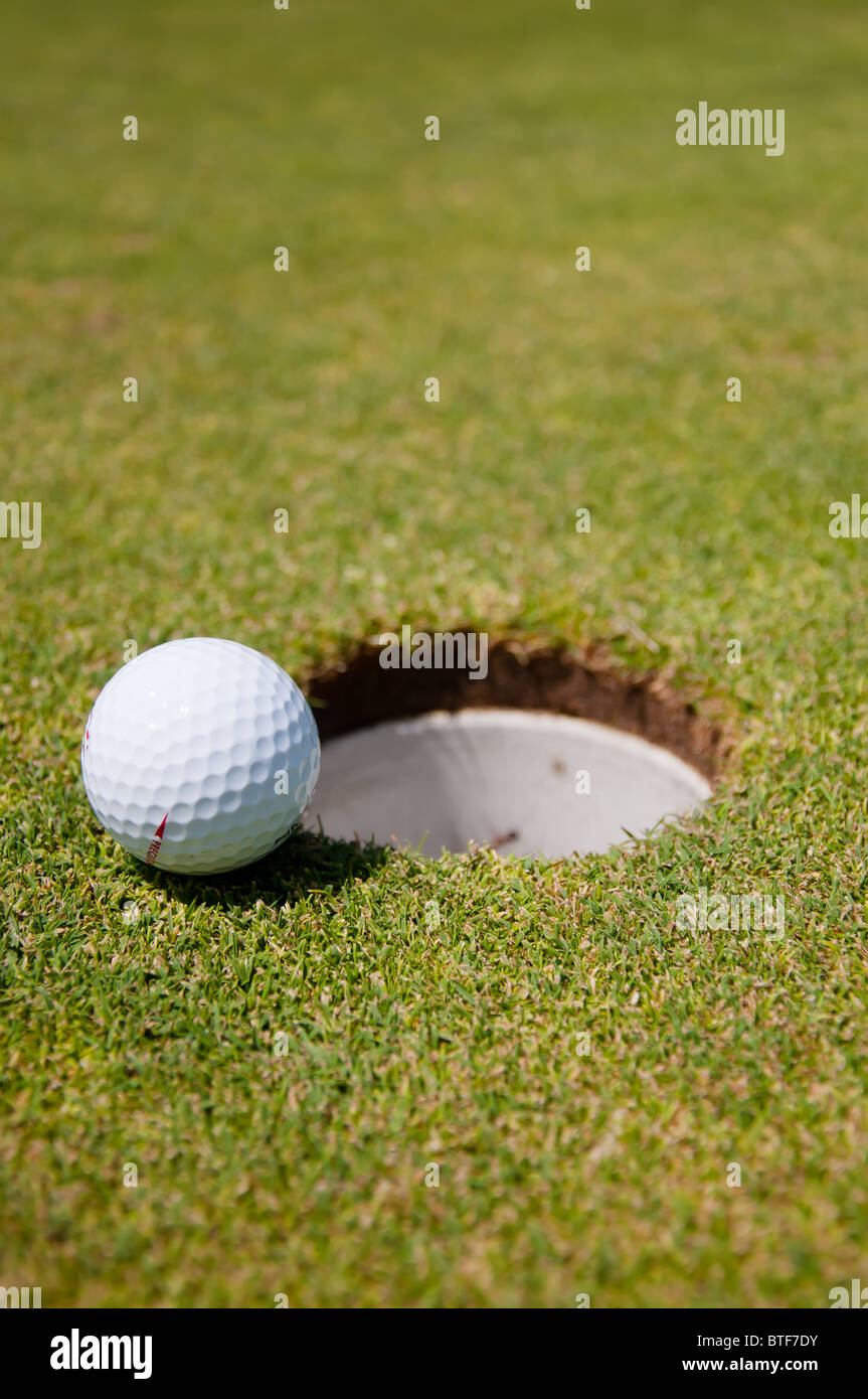 golf hole with ball Stock Photo