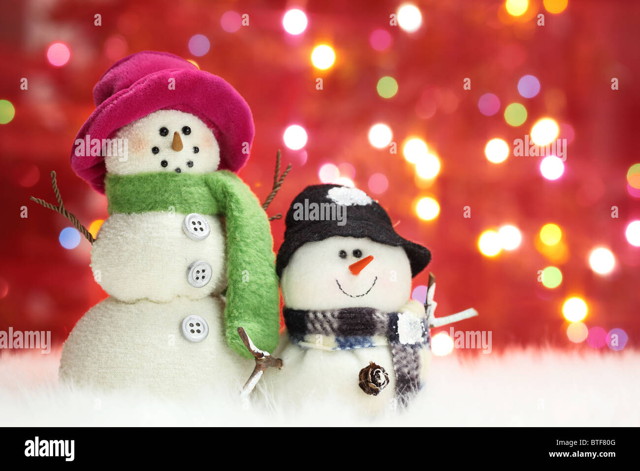 Festive snowman with Christmas light background Stock Photo