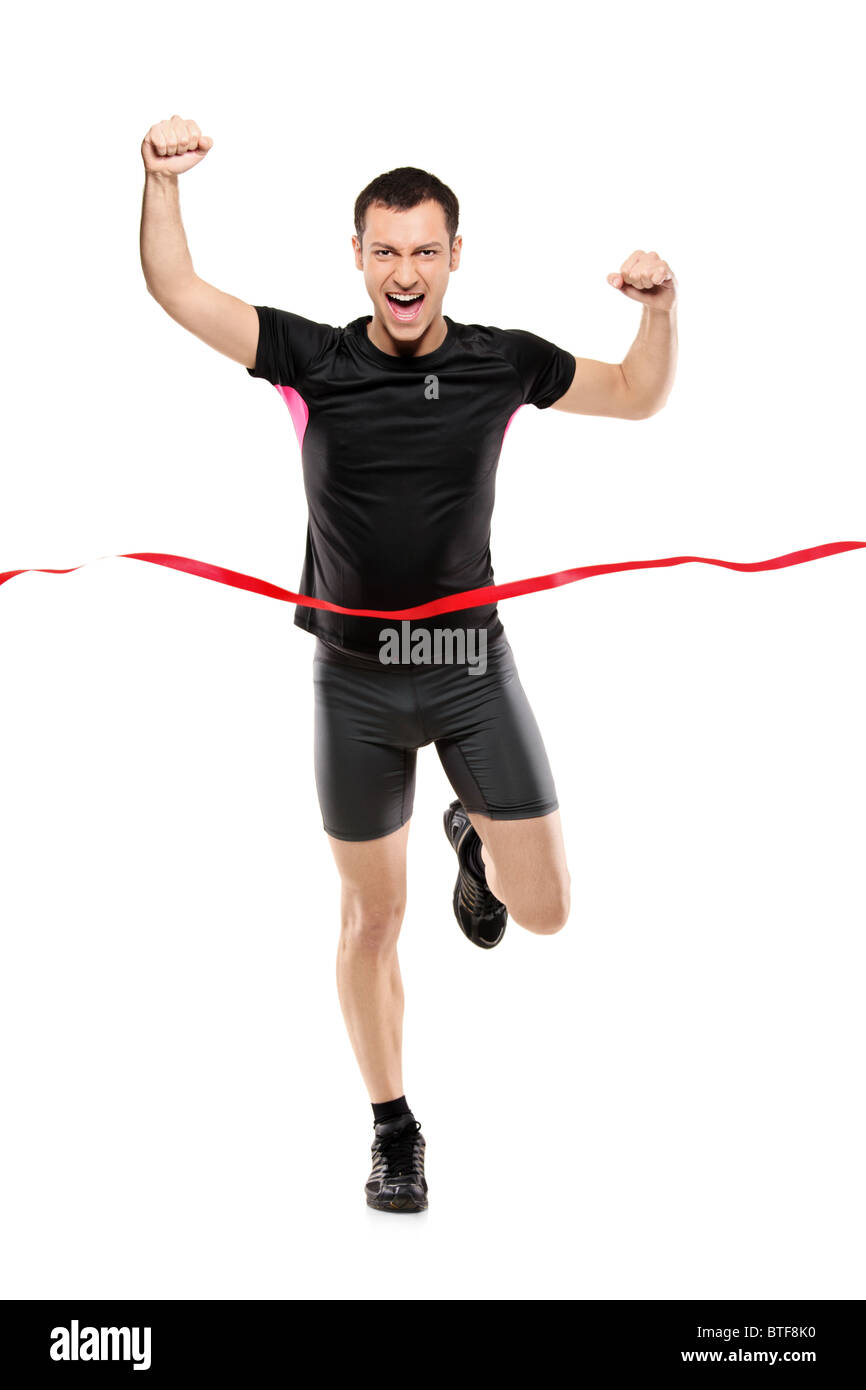Full length portrait of a young runner at the finish line Stock Photo