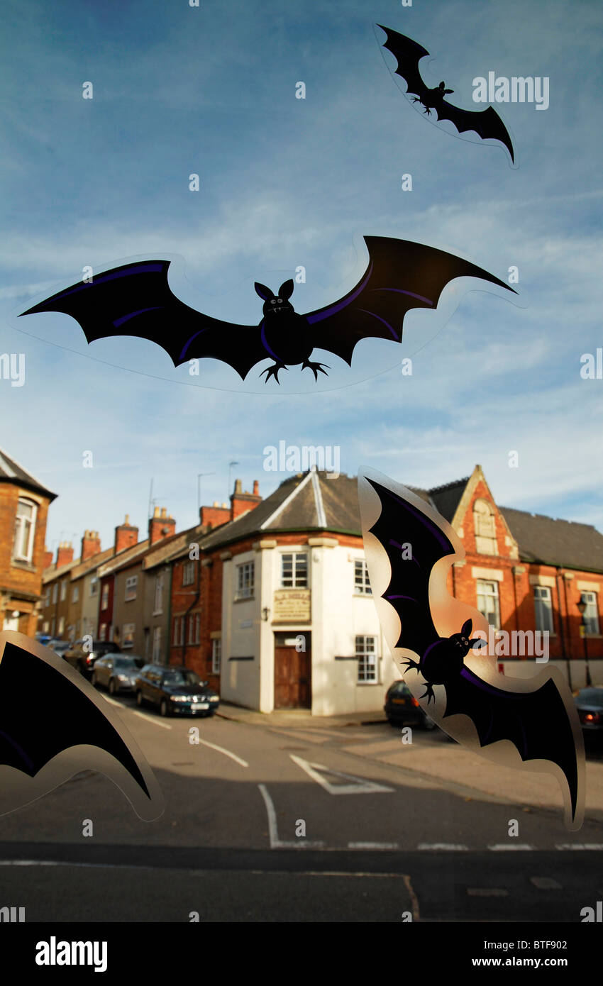 Bat stickers on a window at Halloween in Rothwell, Northants., UK. Stock Photo