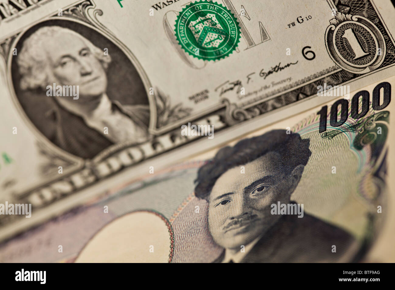 One dollar note and 1000 yen bank note Stock Photo