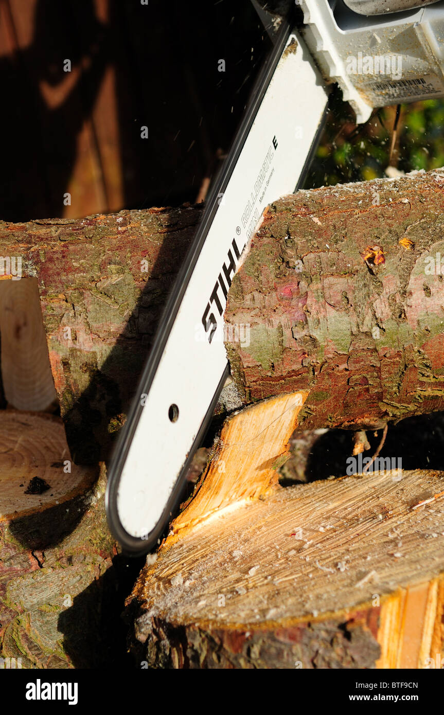 Stihl Chainsaw Cutting Log's Stock Photo Alamy