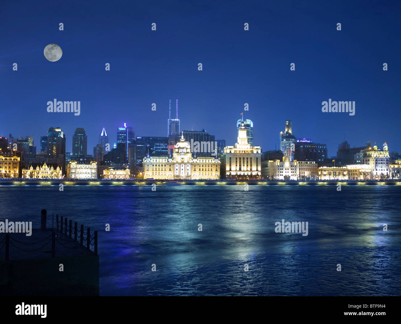 shanghai historic bund night view with a moon Stock Photo