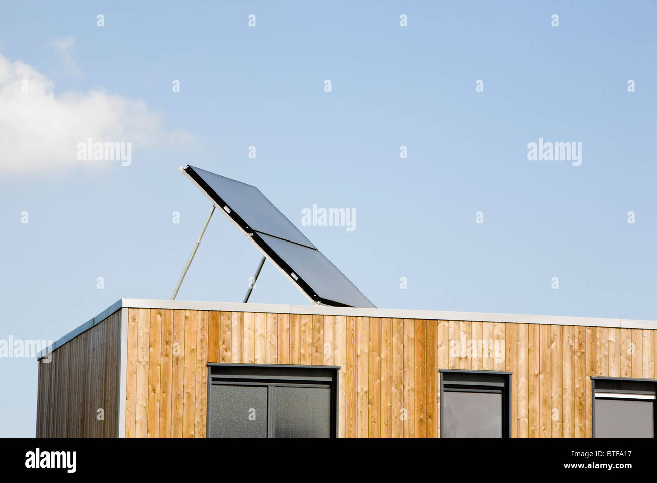 Picture of Apartment building with solar panel Stock Photo - Alamy