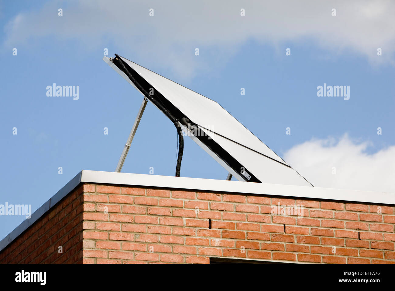 View of Apartment building with solar panel Stock Photo - Alamy