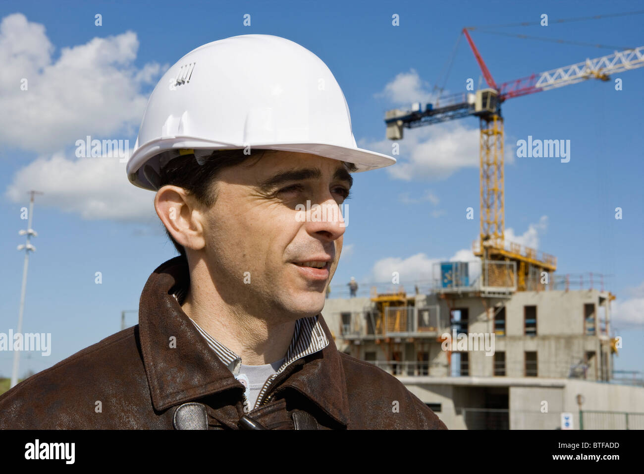 Site foreman in hard hat, portrait Stock Photo - Alamy
