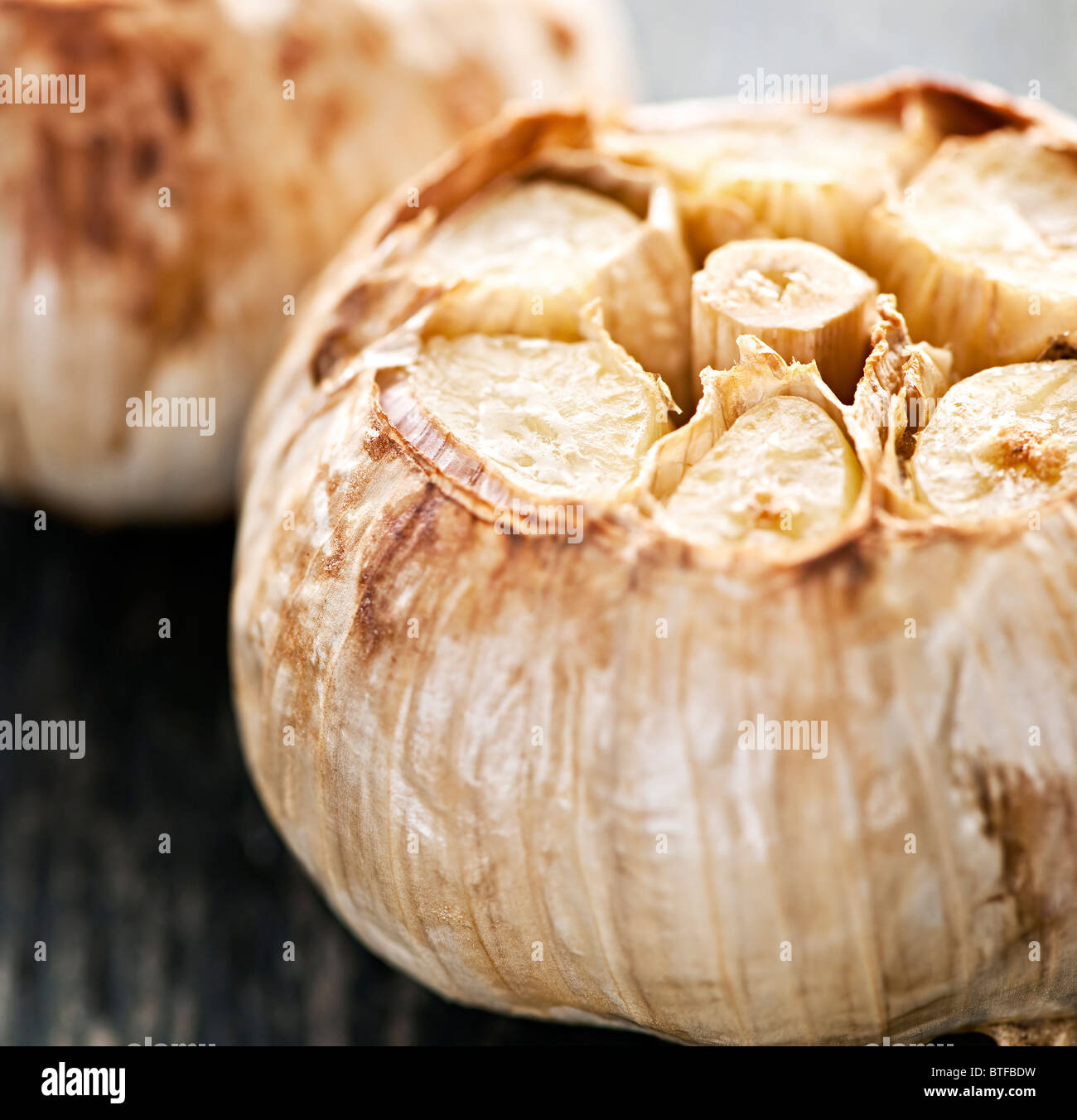 Close up of fresh roasted garlic bulbs Stock Photo