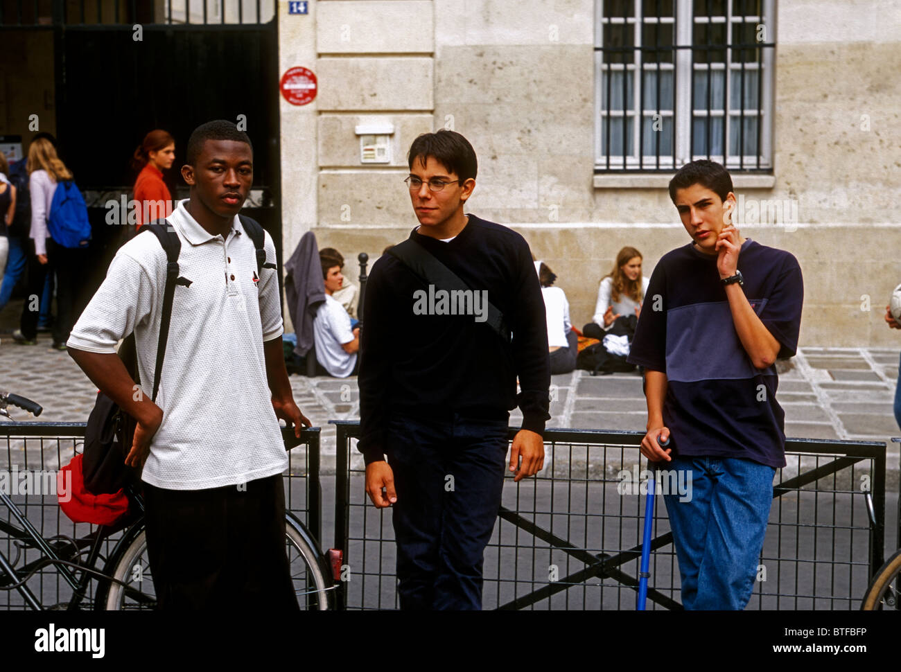 French high school students schoolboys getting together at recess at