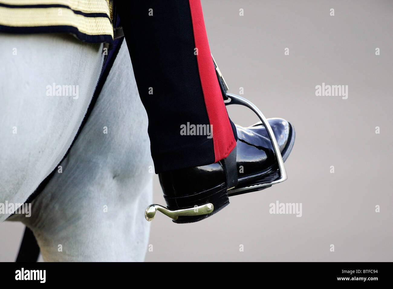 Colonel's foot with spurs in stirrup during a Passing Out Parade at Sandhurst Military Academy in Surrey, UK Stock Photo