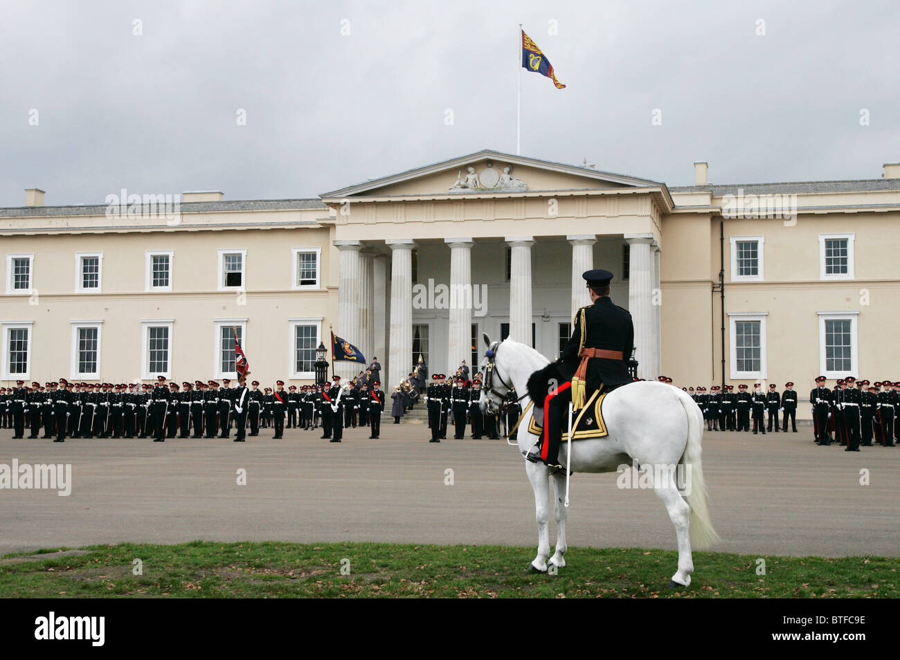 The Colonel leads officer cadets at the Passing Out Parade at Sandhurst Royal Military Academy, Surrey, UK Stock Photo