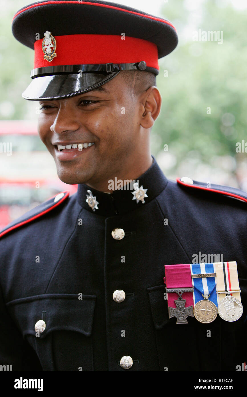 Private Johnson Beharry with Victoria Cross VC medal for bravery at Westminster Abbey, London Stock Photo