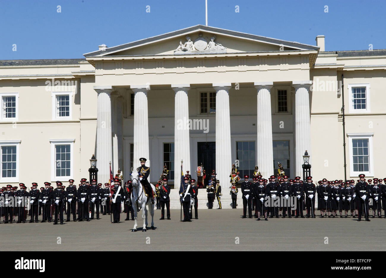 The Colonel leads officer cadets at the Passing Out Parade at Sandhurst Royal Military Academy, Surrey, UK Stock Photo