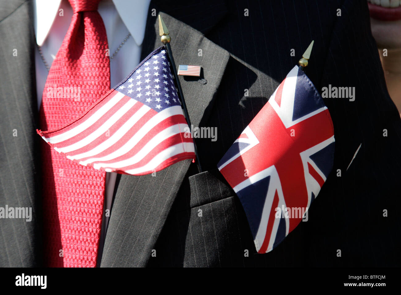 US flag and Union Jack flags symbolic demonstration of detente between USA and UK Stock Photo
