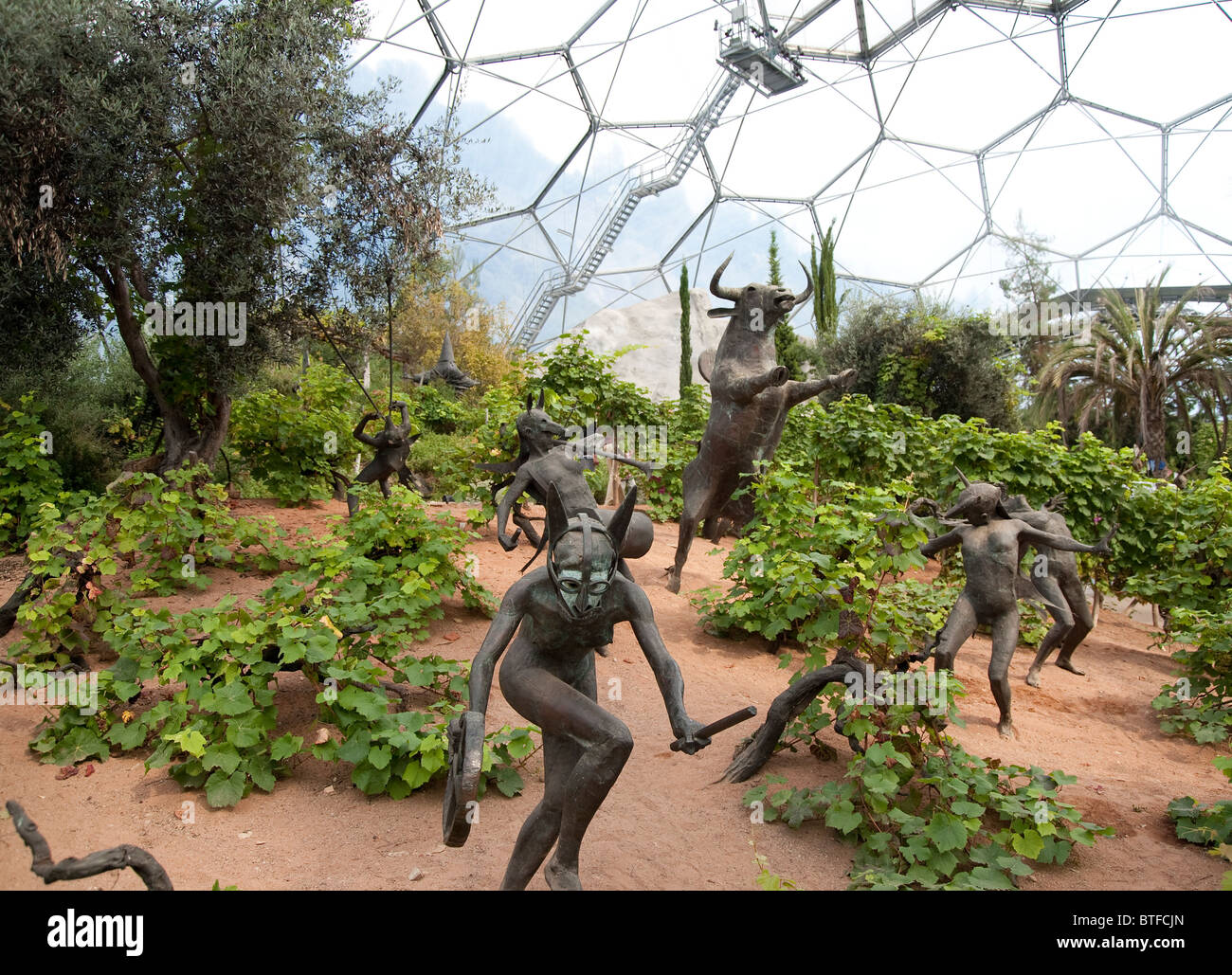 Life size sculpture of Greek God Dionysus and the priestesses musicians Maenad, by Tim Shaw, Eden Project, Cornwall, UK Stock Photo
