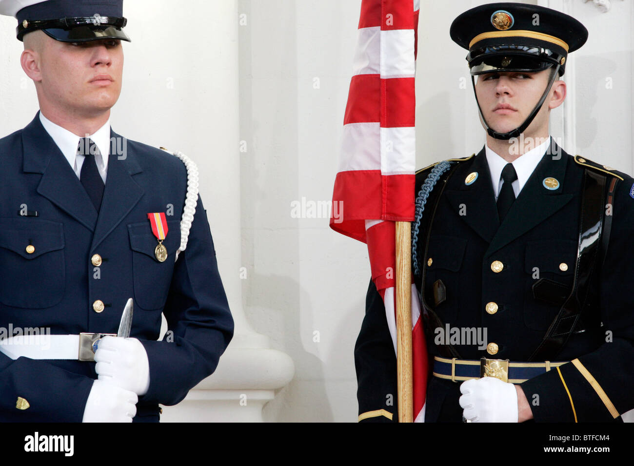 Military officers form Honor Guard traditionally of Airforce, Army, Navy, Coastguard and Marines, at The White House, USA Stock Photo