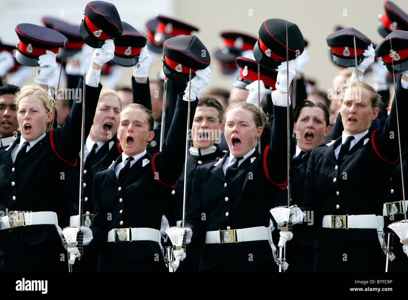 Three cheers from female officer cadets at the Passing Out Parade at Sandhurst Royal Military Academy, Surrey, UK Stock Photo
