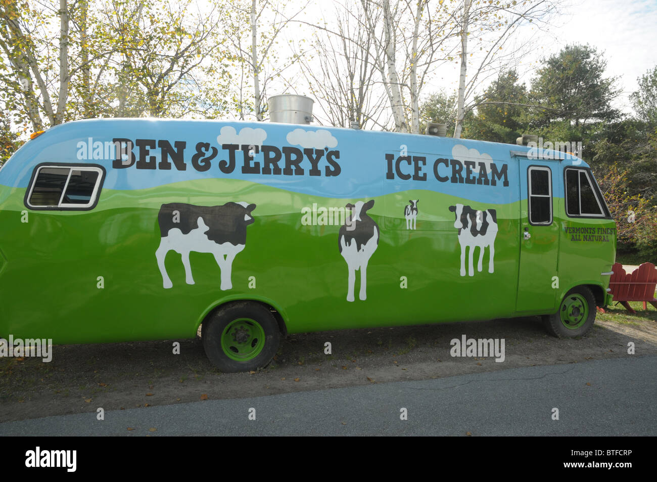 A Ben & Jerry's Ice Cream van sits in the driveway near the entrance to