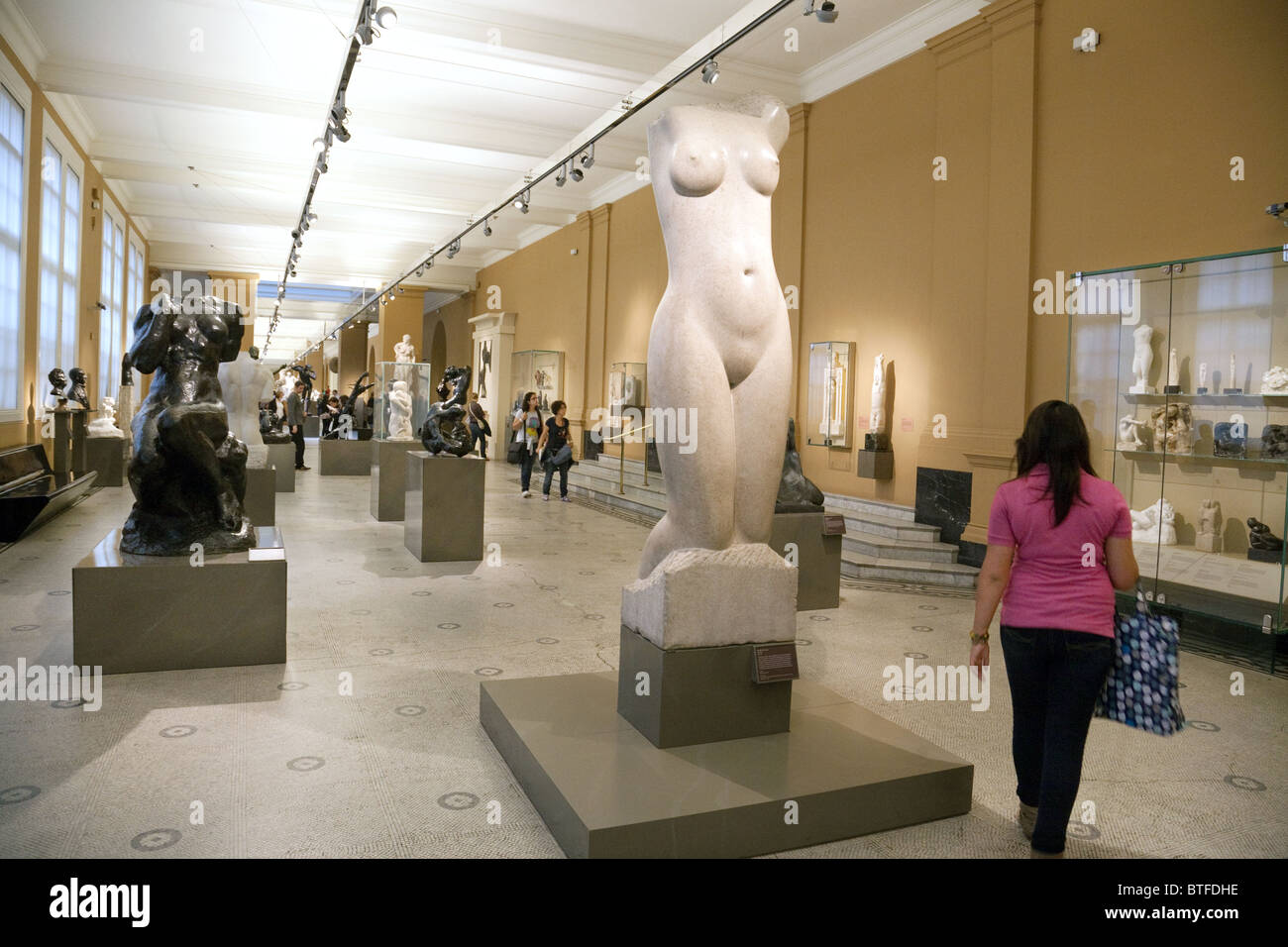 People in the sculpture hall, V&A Museum of Art and Design, (Victoria and Albert museum) , London, UK Stock Photo
