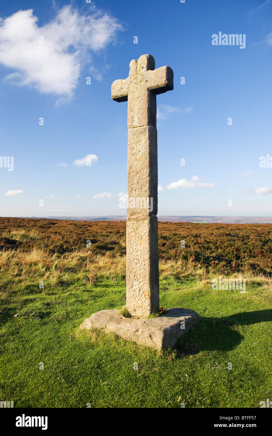 Young Ralph Cross a stone Crucifix on Westerdale Moor in The North York Moors National Park North Yorkshire UK Stock Photo