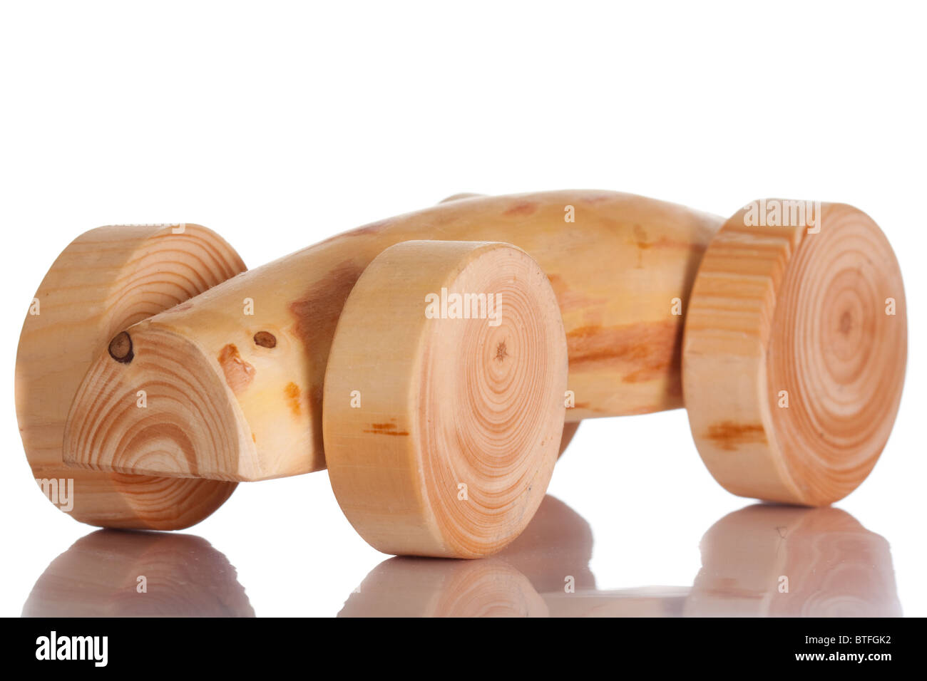 Wood toy car isolated on white with reflection Stock Photo - Alamy