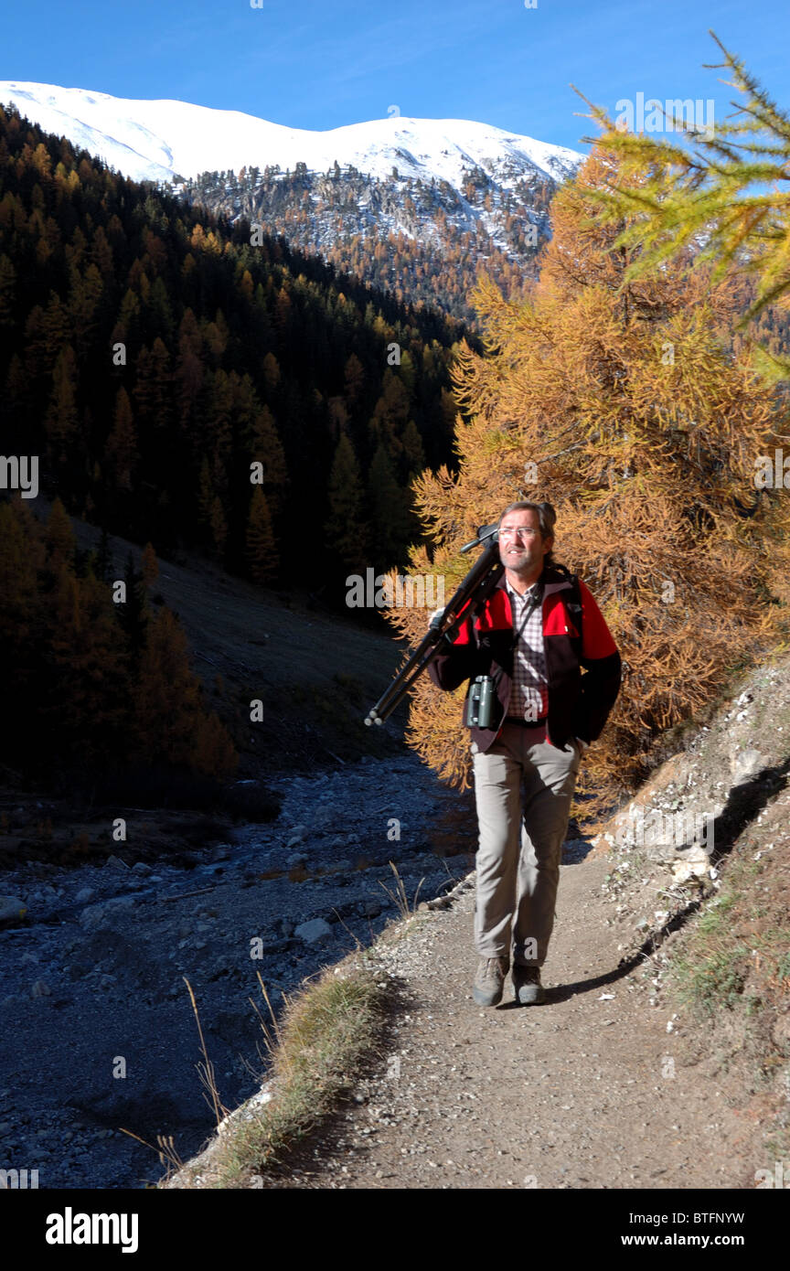 Hiker in Val Trupchun, Swiss National Park, Graubunden, Switzerland Stock Photo