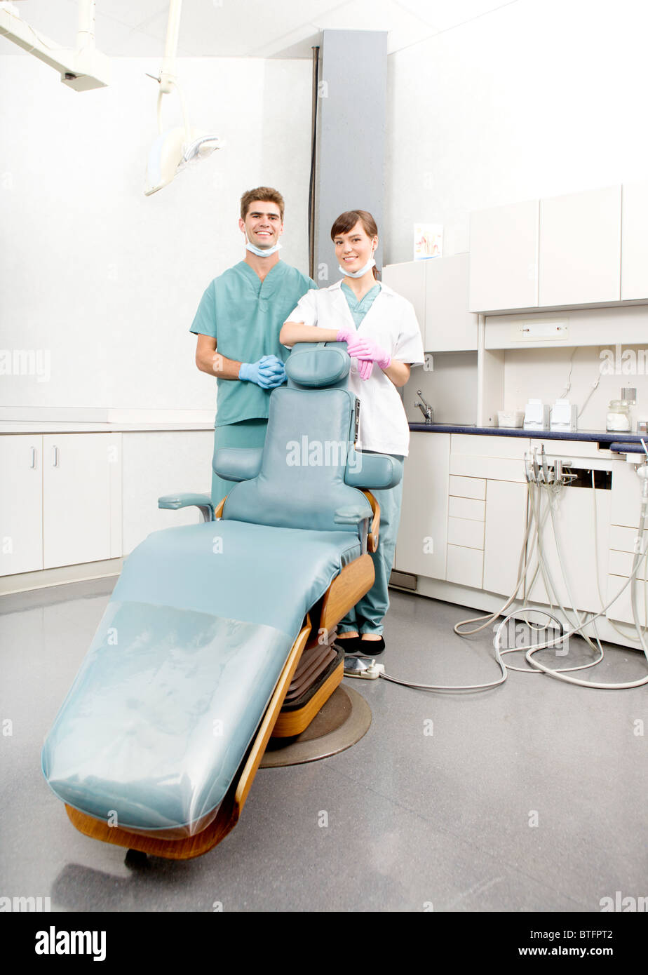 A happy dental team, dentist and assistant in a dental clinic Stock Photo